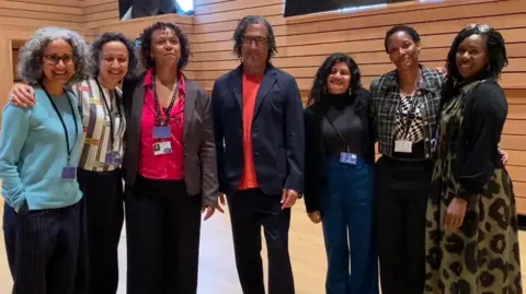 Flo Sparham Historian David Olusoga with the Brighton and Hove team that's delivering the anti racist strategy
