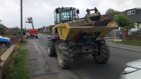 Naj Modak/BBC Digger on road