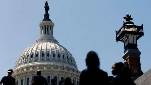 Members of the public walk past the US Capitol in Washington, DC, USA, 04 June 2026