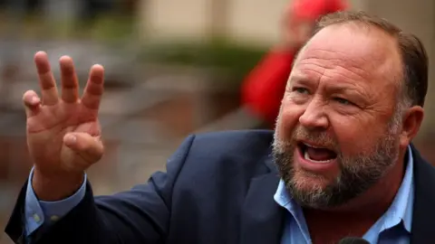 Alex Jones gesticulating in a file photo from 2022