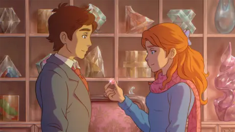 Mano Movies A hand-drawn still from animated movie The Glassworker. It shows a young man dressed in a suit with red tie and a young woman with long red hair facing each other. She's holding up a small pink piece of glass engraved with an intricate pattern that reflects a spark of light at the viewer. Behind them is a shelving unit filled with ornated pieces of glasswork.