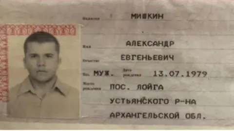 Bellingcat/PA A passport shot of Petrov with passport details next to it, including date of birth - real name Mishkin