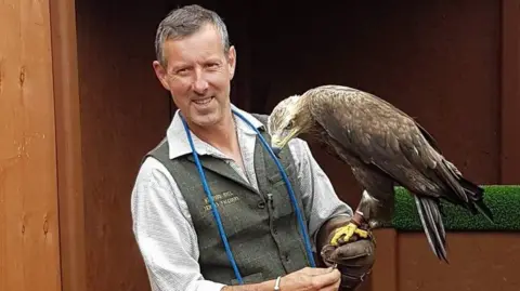 Richard Hall Richard Hall with his eagle Hemlock