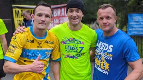 Steve Jones/BBC Josh Warrington (left) with fellow runners