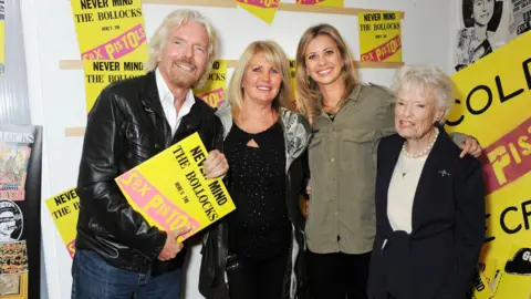 Getty Images Sir Richard Branson, wife Joan Branson, daughter Holly Branson and mother Eve Branson attend a private view of the Virgin Records: 40 Years Of Disruptions