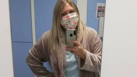 Rachael Blake A selfie of Rachael Blake wearing a mask