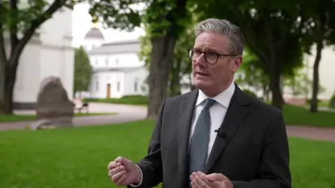 UK Prime Minister Sir Keir Starmer speaks to reporters in Kyiv