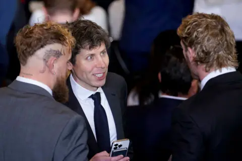 Jake Paul, Zuckerberg and Musk: Who's at Trump's inauguration? Getty Images Sam Altman chats to Jake and Logan Paul