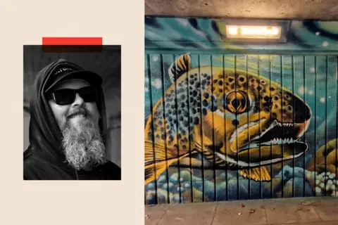 Ryan Davies On the left a close up of Ryan Davies and on the right, a street art mural done by Ryan of a tropical fish