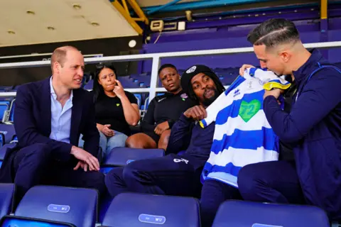 Getty Images Prince William being presented shirt