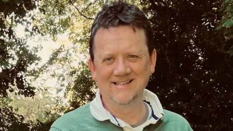 Paul Thorogood Paul Thorogood in a green polo neck shirt 