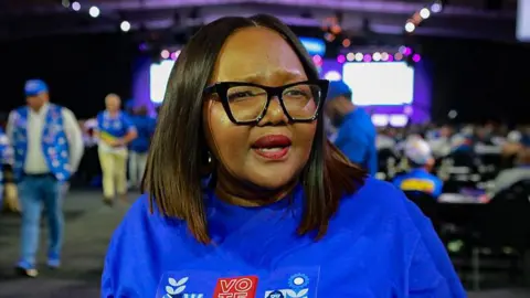 Gallo via Getty Images Siviwe Gwarube is seen speaking at the Democratic Alliance's elective conference