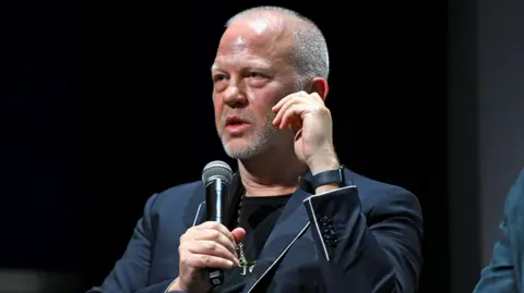 Getty Images Ryan Murphy speaks on stage during Monsters: The Lyle and Erik Menendez Story | NY Tastemaker at the Crosby Hotel on September 12, 2024 in New York City.