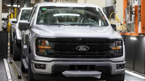 A silver Ford F-150 truck on a production line at the carmaker's Michigan factory. 