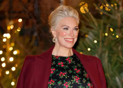 Max Mumby/Indigo / Contributor/Getty Images Hannah Waddingham smiles as she arrives for the service