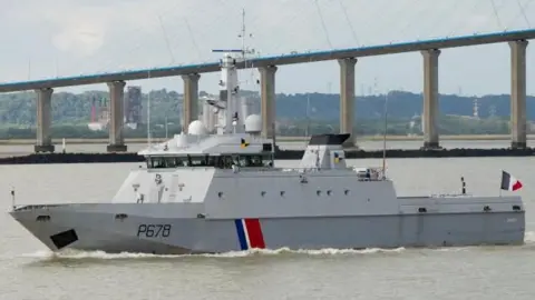 A French Navy patrol ship the Pluvier on the sea