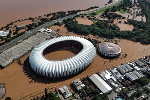 ANSELMO CUNHA/AFP An aerial view of the flooded Beira-Rio stadium of the Brazilian football team Internacional in Porto Alegre, Rio Grande do Sul state, Brazil