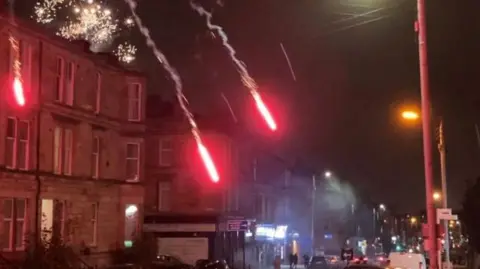 Fireworks being set off in Albert Drive, Pollokshields