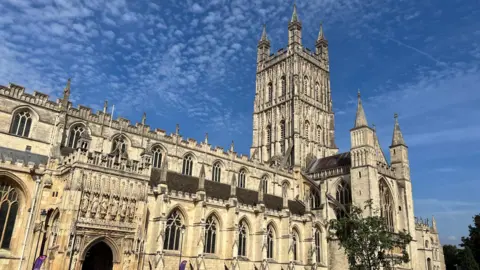 Gloucester Cathedral seen from the outside on a sunny day