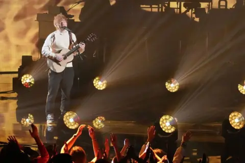 Ed Sheeran pictured in concert.
