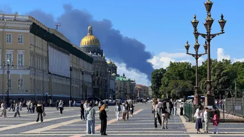 Smoke billowing over central St Petersburg
