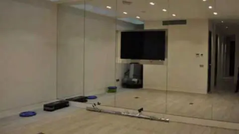 Westminster City Council A gym area with wooden floors and mirrored walls