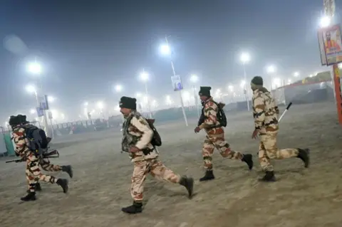 AFP Security personnel arrive at the site of stampede amid the ongoing Maha Kumbh Mela festival in Prayagraj on January 29, 2025.