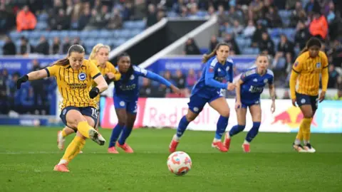 Getty Images Fran Kirby of Brighton & Hove Albion scores her team's second goal from the penalty spot during the Barclays Women's Super League match between Leicester City FC and Brighton & Hove Albion FC at The King Power Stadium 