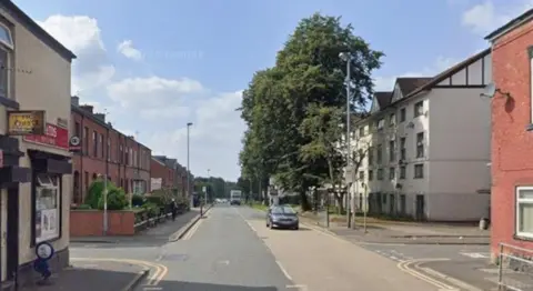 A street view of Tweedale Street. There are houses lining each side of the road