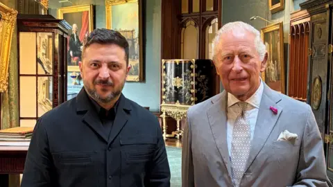 Ukraine's President Volodymyr Zelensky stands side by side with King Charles after a private meeting at Windsor Castle.