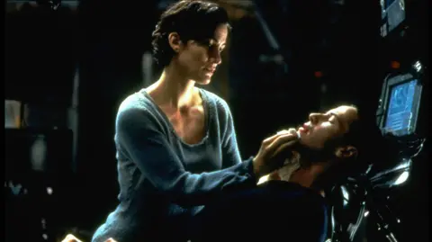 Getty Images Carrie-Anne Moss and Keanu Reeves in The Matrix