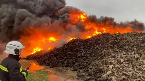 Cleveland Fire Brigade Firefighter at the scene of the fire 