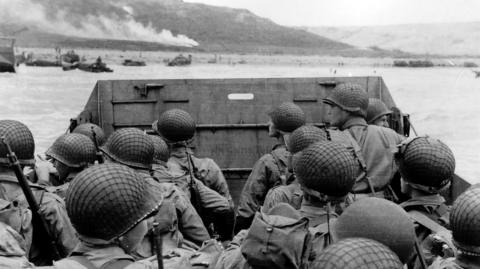 US troops in an LCVP landing craft approach Omaha Beach in Colleville Sur-Mer, France, on June 6th 1944 