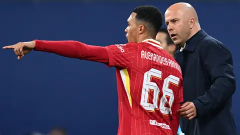 Liverpool manager Arne Slot and defender Trent Alexander-Arnold