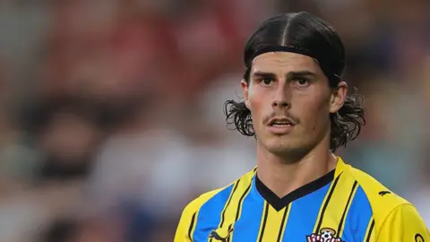 Ronnie Edwards in action for Southampton