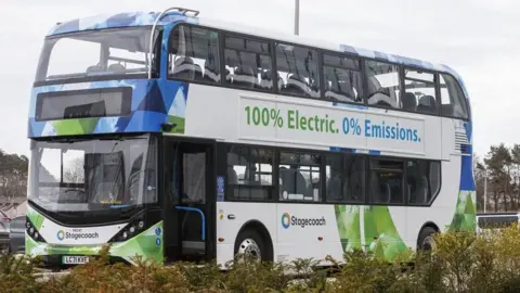 Stagecoach's electric buses in Exeter are having to be temporarily charged by a diesel generator while the company waits for an agreement for its depot to be connected to the grid