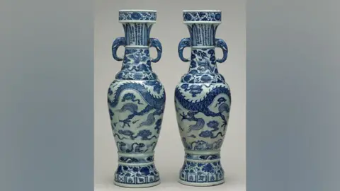 PA Media Two David Vases - blue and white