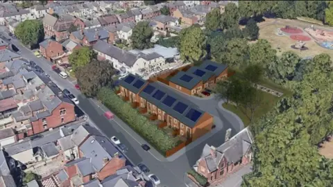 An artist impression aerial view of new homes on a green space in Derby