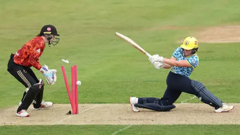 Charis Pavely is bowled after top scoring for Warwickshire Bears