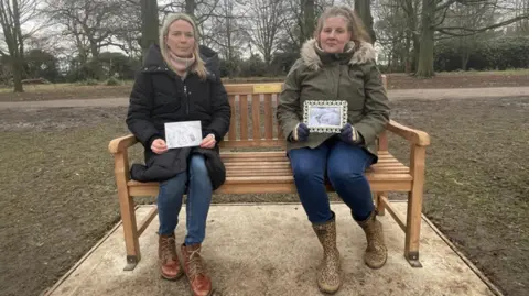 Sarah Hawkins and Sarah Andrews sat together on a bench in a wintry park