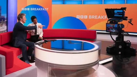 Naga Munchetty and Charlie Stayt in the BBC Breakfast studio