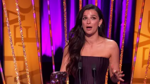 Leading actress winner Marisa Abela gives an emotional speech on stage