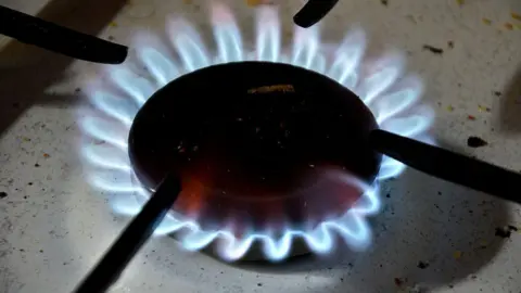 Getty Images  Gas stove burner in operation. 