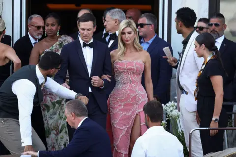 Reuters Ivanka Trump and her husband Jared Kushner in Venice, Italy, for the wedding of Jeff Bezos and Lauren Sanchez. Ivanka is wearing a pink dress and Jared is in a suit and bow tie. 