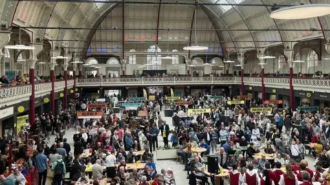 Derby City Council A busy indoor market hall