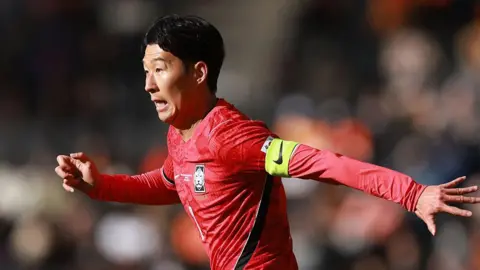 Son Heung-min in action for South Korea during a game in March