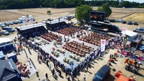 West Nottinghamshire College Aerial shot of the Super Trowel competition, with around 20 bricklayers within a defined area.