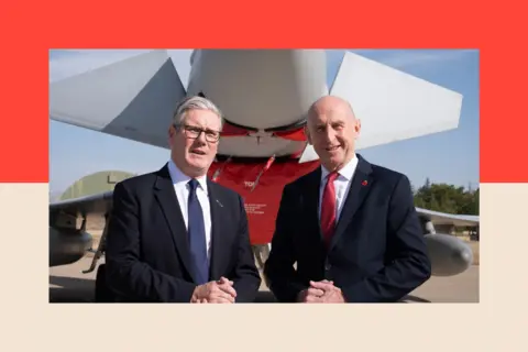 PA Wire Prime Minister Sir Keir Starmer (left) and former Defence Secretary John Healey stand in front of a UK Typhoon fighter jet at Tusas airbase in Ankara