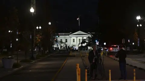 Getty Images A view of the scene near the White House after two members of the US National Guard were shot and critically wounded in Washington DC. 