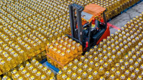 Stock image of cooking oil in warehouse.